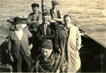 Group on boat with diver